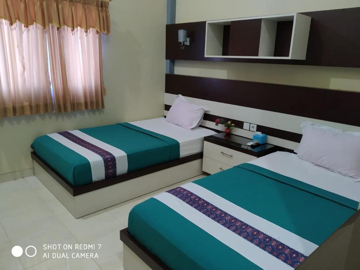 Hotel Pilar Mosa Muarawahau Ngoại thất bức ảnh