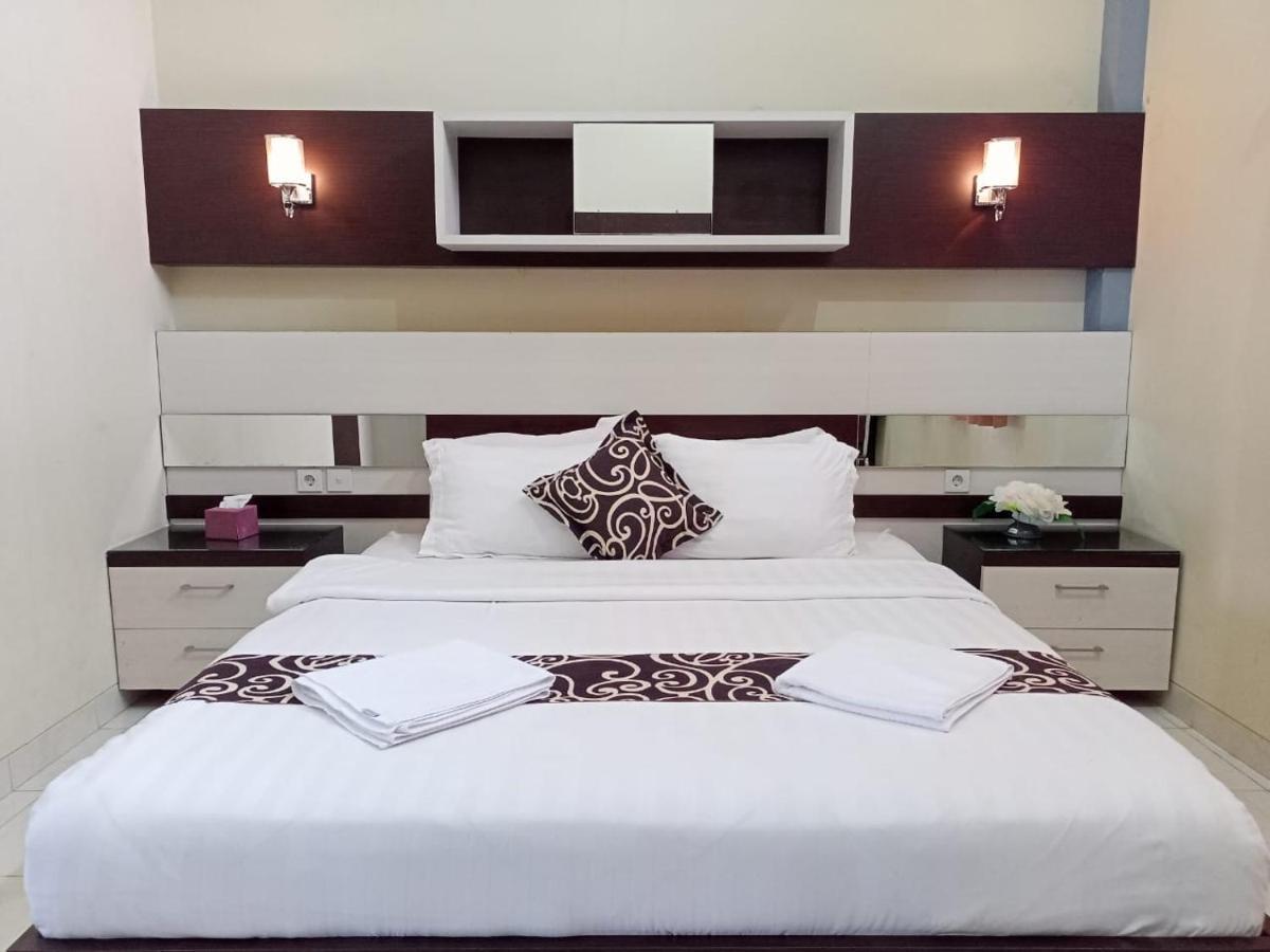 Hotel Pilar Mosa Muarawahau Ngoại thất bức ảnh